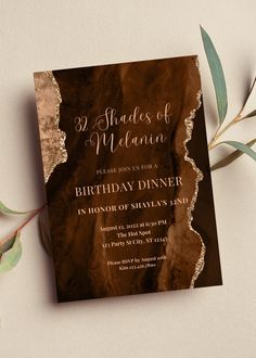 a brown and gold foiled birthday party card