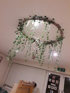 the ceiling is decorated with vines and lights