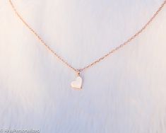 14k solid gold heart necklace is a dainty necklace which represents love... A tiny minimalist heart is a great gift for her which will be with her for a life time because of the real gold material...Elegant and minimalist ♡ ► FEATURES; Material Options:14K White Gold/ Rose Gold / Yellow Gold Length : Standart length is 16''+0.5'' extention chain (The necklace on the photo is also 16'' in length). ❥ I can adjust necklace length to your demands, please add me a note during check out if you wish a Personalized Minimalist Rose Gold Heart Necklace, Minimalist Heart Pendant Charm Necklace For Mom, Minimalist Rose Gold Charm Necklaces For Valentine's Day, Minimalist Rose Gold Heart Pendant Charm Necklace, Minimalist Double Heart Necklace For Mom, Minimalist Double Heart Necklace As Gift For Mom, Minimalist Heart Charm Necklace For Mom, Minimalist Double Heart Necklace - Gift For Mom, Minimalist Double Heart Necklace Gift For Mom