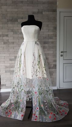 Short flower embroidered ivory tulle wedding dress with corset dress underneath which can be replaced by a simple dress for a better price. Can be customized. Kindly note that this listing is for the dress presented in the first pictures. In case you are interested to buy one of optional items from the last pictures, please let me know. For more wedding dresses, please access https://www.etsy.com/shop/LidiasBoutiqueDesign?ref=seller-platform-mcnav&section_id=23157290. For more wedding skirts Floral Tulle Skirt, 3d Flower Skirt, Short Floral Wedding Dress, Wedding Dress Embroidered Flowers, Short Corset Wedding Dress, Wildflower Wedding Dress, Wedding Skirt Separate, Floral Embroidered Wedding Dress, Detachable Wedding Skirt