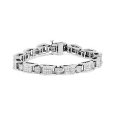 A must have for any serious jewelry collection, this stunning 14K white gold tennis bracelet boasts an impressive 5.0 carat total weight of diamonds. The bracelet features D or bridge shaped links that alternate between large and small sizes both inset with invisible set grids of square, princess cut white diamonds. Each diamond studded link is connected by hinges. Elegant and timeless, this gorgeous 7” tennis bracelet fastens securely with a box with tongue and safety clasp. This classic, bold bracelet makes a great gift for any special occasion! Whether worn for daytime glamour or evening sparkle, this bracelet is gorgeously versatile. Give her a gift that will perfectly complement her favorite ensemble. Gold Tennis Bracelet, Princess Cut Gold, Bracelet Tennis, Princess Cut Diamond, Radiant Diamond, Princess Cut Diamonds, Tennis Bracelet, White Diamonds, Diamond Studs