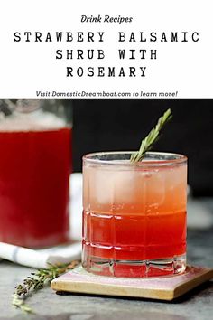 strawberry balsamic shrub with rosemary in a glass on a cutting board next to another drink