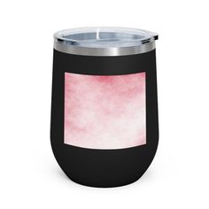 a black and pink cup with a silver lid on a white background is shown in front of the image