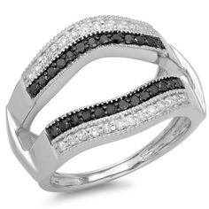 a white gold ring with black and white diamonds