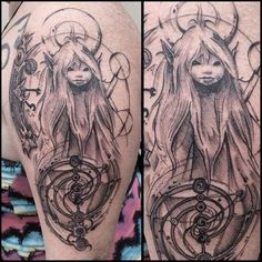 a woman with long hair and horns on her arm is depicted in this tattoo design