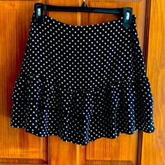 Cute And Flirty Black And White Polka Dot Mini Skirt. Size Small And New With Tags Casual Fitted Polka Dot Mini Skirt, Fitted Polka Dot Mini Skirt, Fitted Polka Dot Mini Skirt For Spring, Chic Polka Dot Mini Skirt, Fitted Polka Dot Skirt With Lining, Polka Dot Mini Skirt With Lining, Polka Dot Lined Mini Skirt, Polka Dot Pleated Fitted Skirt, Fitted Polka Dot Pleated Skirt