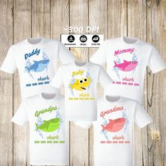 three t - shirts with the words daddy, shark and shark in different colors on them