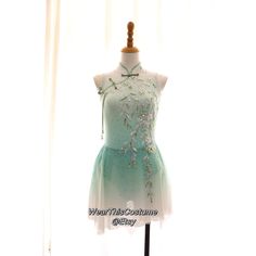 a dress on display in front of a window