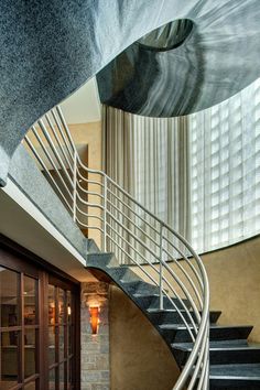 a spiral staircase in the middle of a building