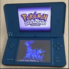 an old nintendo gameboy with the logo for pokemon diamond version on it's screen