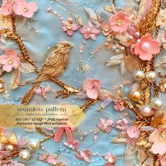 a blue background with pink flowers, pearls and gold birds on it's sides