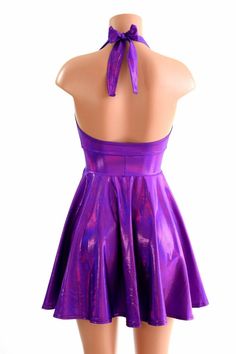 "This item is made to order, please read all the way through the listing before purchasing! This flowy dress is made of beautiful grape purple holographic spandex. The halter top is darted and ties behind the neck, the hemline is circle cut. Length: 17\" measured from the waist to the hemline. We can create this dress from any other fabric in our shop, just ask! Womens Sizing (See below for instructions on where measurements should be taken) XXS: Bust 29\"-30\" / Waist 22\"-23\" / Hips 30\"-32\" Purple Holographic, Olive Branch, Flowy Dress, Tie Backs, Purple Dress, Tie Back, Skater Dress, Green And Purple, Halter Top