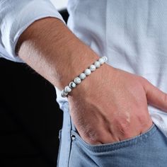 Embrace tranquility with our Certified Men's White Howlite Bracelet, a symbol of calm and style. This is not just a bracelet; It is a reflection of serenity and is perfect for elevating your appearance with positive energy. Made with Certified White Howlite, this Natural Stone Men's Jewelry is a versatile and stylish Crystal Bracelet. Crystal beads add a sophisticated touch, making it an indispensable accessory for men seeking both fashion and tranquility. 💎All stones are unique and may differ Modern White Adjustable Bracelets, Modern Adjustable White Bracelet, Everyday Stretch Bracelet With Round Beads, Modern White Bracelets With Round Beads, Modern White Round Beads Bracelets, Modern White Round Bead Bracelets, Modern White Round Beaded Bracelets, White Casual Bracelet For Meditation, Casual White Bracelet For Meditation