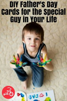 a young boy sitting on the floor with his hands painted in different colors and saying, diy father's day cards for the special guy in your life