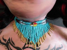 Festival Choker With Large Beads, Adjustable Gold Turquoise Necklace With Colorful Beads, Adjustable Gold Beaded Necklace For Festival, Adjustable Gold Turquoise Beaded Necklace, Traditional Tiny Beads Choker For Festivals, Traditional Festival Choker With Tiny Beads, Turquoise Choker With Colorful Beads, Southwestern Beaded Choker For Festivals, Adjustable Turquoise Bead Choker