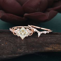 an engagement ring with a princess's crown on top and a heart shaped diamond in the middle