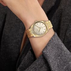 With its beige dial and gold case, this timepiece emanates a distinctive vintage allure. The dial displays a concave-convex radial texture, suitable for both casual wear and sophistication. Adorned with lab-grown diamonds, each hour marker sparkles with enchanting brilliance, enhancing the overall elegance of the design. Case: 31mm steel case with polished and satin finish Movement: Ronda 763 Waterproofness: 10ATM swimming is allowed, but only for shallow swimming (Do not operate the watch handl Antique Bridal Jewelry, Personalized Anniversary Gifts, Watch Gift, Blue Raspberry, Ring Pendant Necklace, Band Engagement Ring, Oat Milk, Engraved Necklace, Gold Case