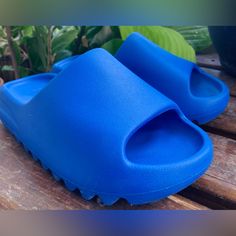 Super Comfortable Never Worn Out Yeezy Slides Size 5 Men’s. Bold, Vibrant Azurite Blue, Unique In Color. Size 5 Men’s Runs Like A Size 6 Female. Not In Original Box. Blue Sporty Slides For Outdoor, Breathable Blue Slide Sandals, Sporty Blue Slides For Streetwear, Blue Sporty Slides For Streetwear, Casual Blue Slides For Streetwear, Blue Slip-on Slides For Streetwear, Comfortable Blue Slides For Outdoor, Adidas Yeezy Slides, Yeezy Slides