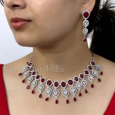 BEAUTIFUL AMERICAN DIAMOND NECKLACE SET *  Main Color : Ruby * Skin Friendly : This Product does not contain harmful constituents. Anti-allergic safe for Skin. * Quality : Made from Premium Quality Material. This Product assures to remain in its Original Glory even after several usages.     . Actual Images of item are shown above, Please be aware of the actual colors may vary from the color shown on your screen, as monitor    settings may vary from individual to individual. . Welcome to Our Etsy Crystal Jewelry Sets For Anniversary On Valentine's Day, Crystal Jewelry Sets For Anniversary And Valentine's Day, Cubic Zirconia Jewels Jewelry Sets For Celebration, Cubic Zirconia Jeweled Jewelry Sets For Celebration, Silver Jewelry Sets With Matching Earrings For Valentine's Day, Cubic Zirconia Jewelry Sets For Celebration, Cubic Zirconia Jewelry With Matching Earrings For Valentine's Day, Valentine's Day Silver Jewelry Sets With Matching Earrings, Valentine's Day Cubic Zirconia Jewelry With Matching Earrings