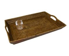 a wicker tray with a wine glass on it