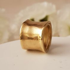 18k Solid Gold Textured Extra Wide RingProduct description:Metal 18k solid gold  weight 10.5g, Width 16 mm, Thickness 1.5-3 mmYou can also get this ring :You can get this ring also in 14k gold You can get this ring is Rose Pink and white goldYou can get this ring engravedPlease send me a convo, and I will send you PO for the  customization SKU RMGY589 Thick Gold Wedding Band, Organic Wedding Band, Thick Gold Ring, Gold Thumb Rings, Unique Gold Rings, Modern Wedding Band, Hammered Gold Ring, Wide Wedding Bands, Rough Jewelry