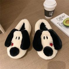 One of the most amazing things about Winters is that you can wear soft, fluffy, and comfy slides that could keep you warm all day long. Shop for The Marianne Snoopy Big Nose Dog Slides that features a dog's face with big ears. You can choose between open heel or covered heel slides as per your convenience and look perfect this winter. FEATURES: Style: Closed toe, open toe, covered heel, open heel Design: Cartoon Sole material: Rubber TPR Vamp material: Soft and comfy fluffy fabric Season: Winter Black Fluffy Slippers For Winter, Super Soft Black Winter Slippers, Comfortable Plush Winter Slippers, Casual Plush Slippers For Winter, Comfortable Plush Slippers For Winter, Soft Black Winter Slippers, House Slippers Womens, Slipper For Women, Dog Slippers