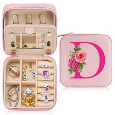 a pink case filled with lots of jewelry