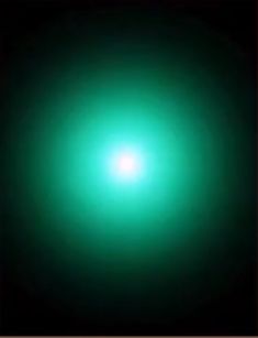 an image of a green light in the dark