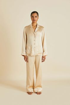 For those who like their martinis dry and their pyjamas quietly elegant, there’s nothing better than our stalwart Coco pyjama set. Crafted from sublime light caramel 19-momme silk, she’s the epitome of understated chic. \n\n Material: 100% silk Material Weight: 19 momme Material Weave: silk satin Colour: caramel Product Code: CT0058 Silk Pyjamas, Olivia Von Halle, Honeymoon Lingerie, Wardrobe Solutions, Silk Pajama Set, Satin Color, Satin Pajamas, Luxury Silk, Silk Pajamas