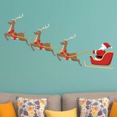 santa's sleigh with reindeers flying in the sky wall decal