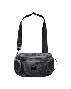 a gray camo bag with black straps