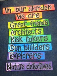 a sign that says in our garden we are great friends, architecture, risk takers, denbulders, explorer's nature