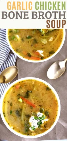 two bowls of garlic chicken bone broth soup with spoons and napkin on the side