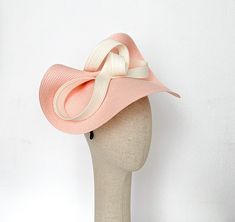 Elegant Blush kentucky derby hat, bow kentucky derby fascinator ascot hat, Light pink hat, light salmon ascot fascinator, womens races hats, bow fascinate hat. This and Soft Pink fascinate hat is embellished with a cream big bow. It is a perfect hat for weddings, Royal Ascot horse races, cocktails, derby... It is mounted on a headband. If you want, you can choose the side of the head were you like to wear the fascinator, just convo me. Any color of the fascinator can be changed to order. * PROCE Evening Hat With Bow For Royal Ascot, Kentucky Derby Fascinator With Bow, Mini Hat With Bow For Kentucky Derby, Formal Summer Hat With Bow, Summer Formal Hat With Bow, Pink Party Hat With Bow, Chic Spring Hat With Bow, Adjustable Bow Hat For Royal Ascot, Kentucky Derby Garden Party Hat With Bow