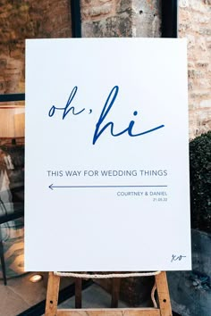 a sign that says oh hi this way for wedding things