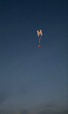 a person flying a kite in the sky