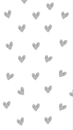 a white background with hearts drawn in grey on the bottom right corner, and one smaller heart at the top left corner