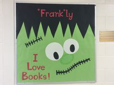 a green poster with the words franky i love books written on it in front of a white brick wall