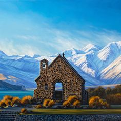 a painting of a church in the mountains with snow covered mountains behind it and water below