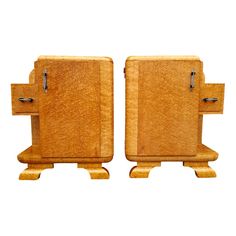 pair of wooden bookends made out of wood with metal handles on each side