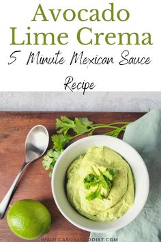 avocado lime cream in a white bowl with cilantro on the side