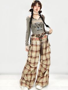 These pants feature an all-over plaid pattern and come with cargo pockets. Designed in a straight-leg fit, they are perfect for flattering the leg shape and providing a slimming effect. The sides of the legs are adorned with ruched detailing for added style.   The price includes only one pair of pants. SizeSMLWaist687276Length105107109Hips9296100 Plaid Full Length Pants For Fall, Casual Plaid Bottoms With Belt Loops, Trendy Plaid Bottoms With Pockets, Plaid Full-length Pants For Fall, Casual Wide-leg Patchwork Cargo Pants, Plaid Trousers With Pockets, Grunge Plaid Pants, Plaid Wide-leg Pants With Pockets, Steampunk Fashion Female