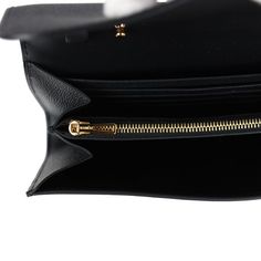 This Constance Wallet To Go is in Black epsom leather with gold hardware and has tonal stitching, metal "H" snap lock closure, open front compartment and removable crossbody strap.The interior is lined with Black epsom leather and two main compartments with six credit card slots and a zippered center compartment with Hermes H lock pull.Collection: WOrigin: FranceCondition: New and never worn (plastic on hardware) Accompanied by: Hermes box, felt, strap, strap dustbag and ribbonMeasurements: 8" w Business Bifold Wallet With Gold-tone Hardware, Bifold Business Wallet With Gold-tone Hardware, Black Business Wallet With Gold-tone Hardware, Business Black Wallet With Gold-tone Hardware, Evening Bag In Epsom Leather With Metal Hardware, Luxury Bifold Wallet With Gold-tone Hardware, Luxury Wallets With Gold-tone Hardware For Everyday Use, Luxury Wallets With Gold-tone Hardware For Business, Formal Wallet With Gold-tone Hardware