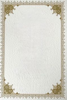 a white and gold paper with an ornate border on it's edges is shown