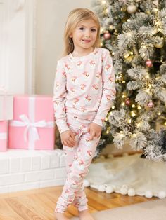 Celebrate the magic of the holiday season with our Family Pajamas. Perfect for creating sweet, lasting memories with your family, these matching pajamas bring a sense of togetherness and festive cheer. Made from our signature ButterSoft fabric, you'll stay cozy and comfortable, whether you're decorating the tree, baking cookies, or enjoying a holiday movie night together. Sizing Model is wearing YS. YS = 6/7 | Chest 22.75", Waist 20.75", Hips 22", Inseam 28" YM = 8 | Chest 24.5", Waist 22.5", Hi Holiday Movie Night, Erin Gray, Baby Pjs, Childrens Pyjamas, Comfy Sets, Baking Cookies, Holiday Movie, Matching Pajamas, Santa Baby