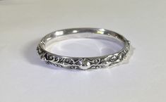 Original antique sterling silver bracelet from the late 1800s to early 1900s. Clasp is tight. Normal wear, in very good condition. 12.1 grams. Marked "STERLING" Victorian Style Silver Engraved Bangle, Victorian Sterling Silver Bracelet, Engraved For Formal Occasions, Victorian Hallmarked Silver Bracelet, Victorian Hallmarked Silver Bracelets, Victorian Hallmarked Silver Cuff Bracelet, Pensacola Fl, Sterling Silver Bracelet, Early 1900s, Antique Art