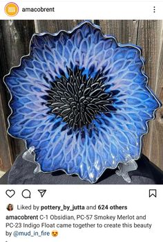 an instagramted photo of a blue flower dish