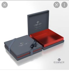 an open box with a bow on the lid