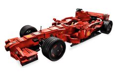 a red lego race car is shown on a white background