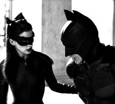 batman and catwoman in the dark knight rises movie scene, black and white photograph